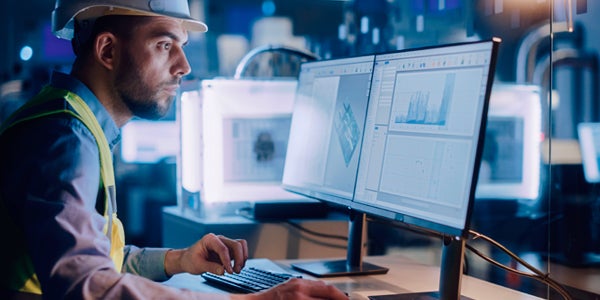 Construction worker using computer