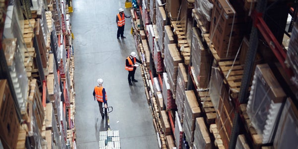 warehouse employees checking inventory